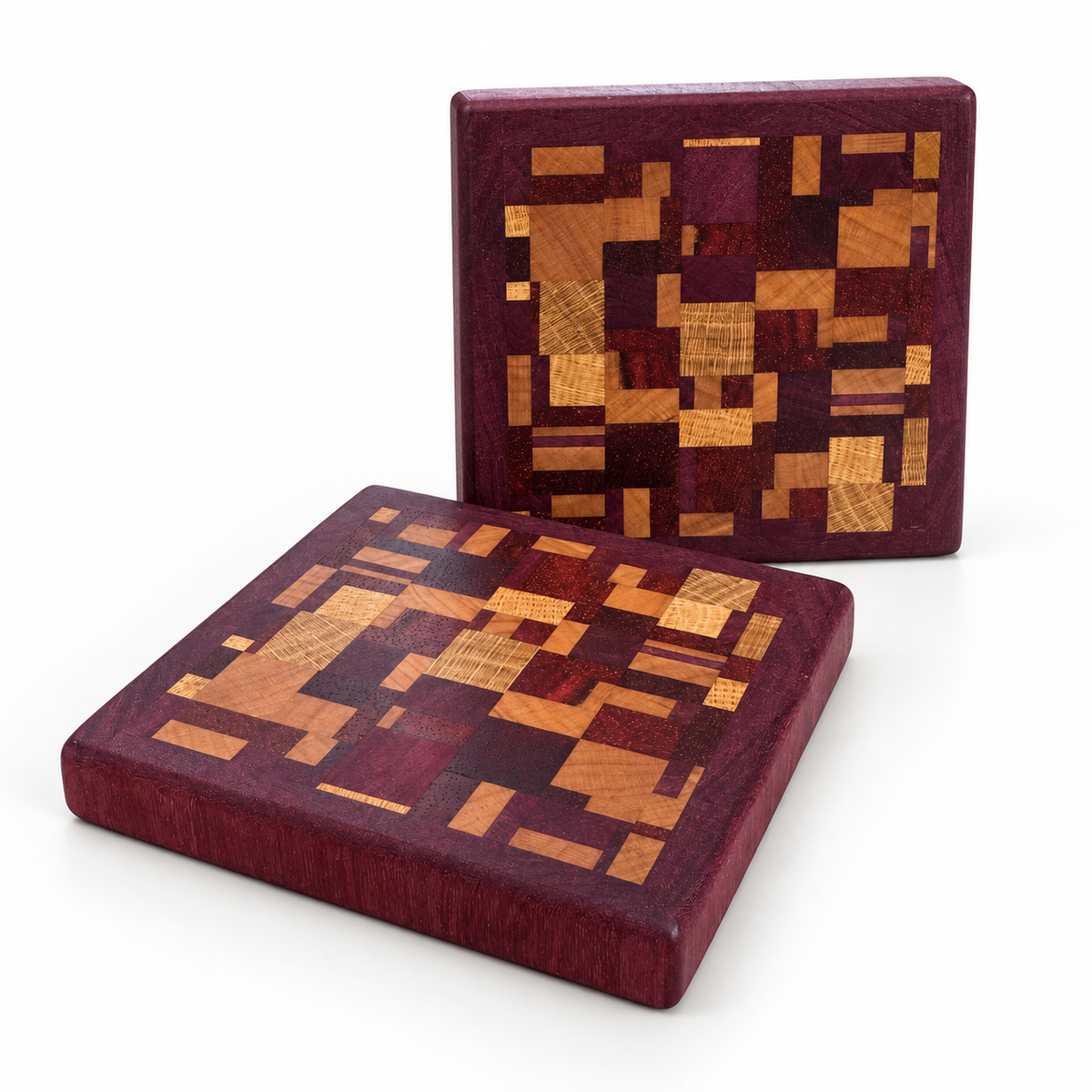 Pair of chaotic end grain wooden coasters on a white background