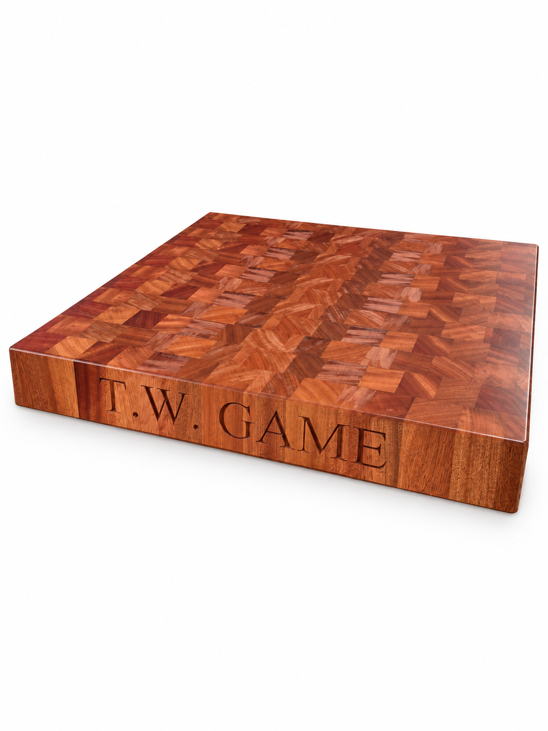 Engraved end-grain chopping board on a white background