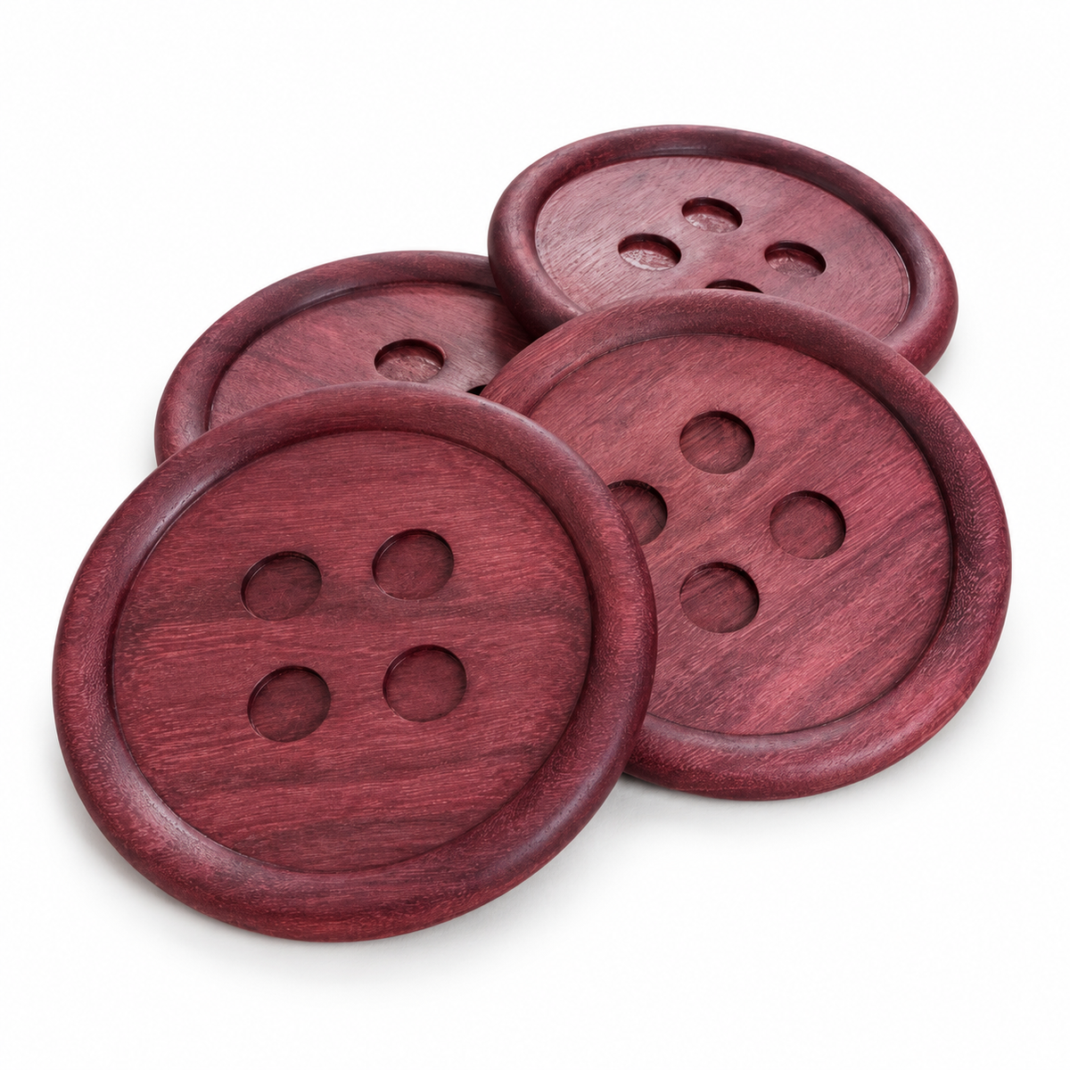 Four Purple Heart wooden button coasters on a white background