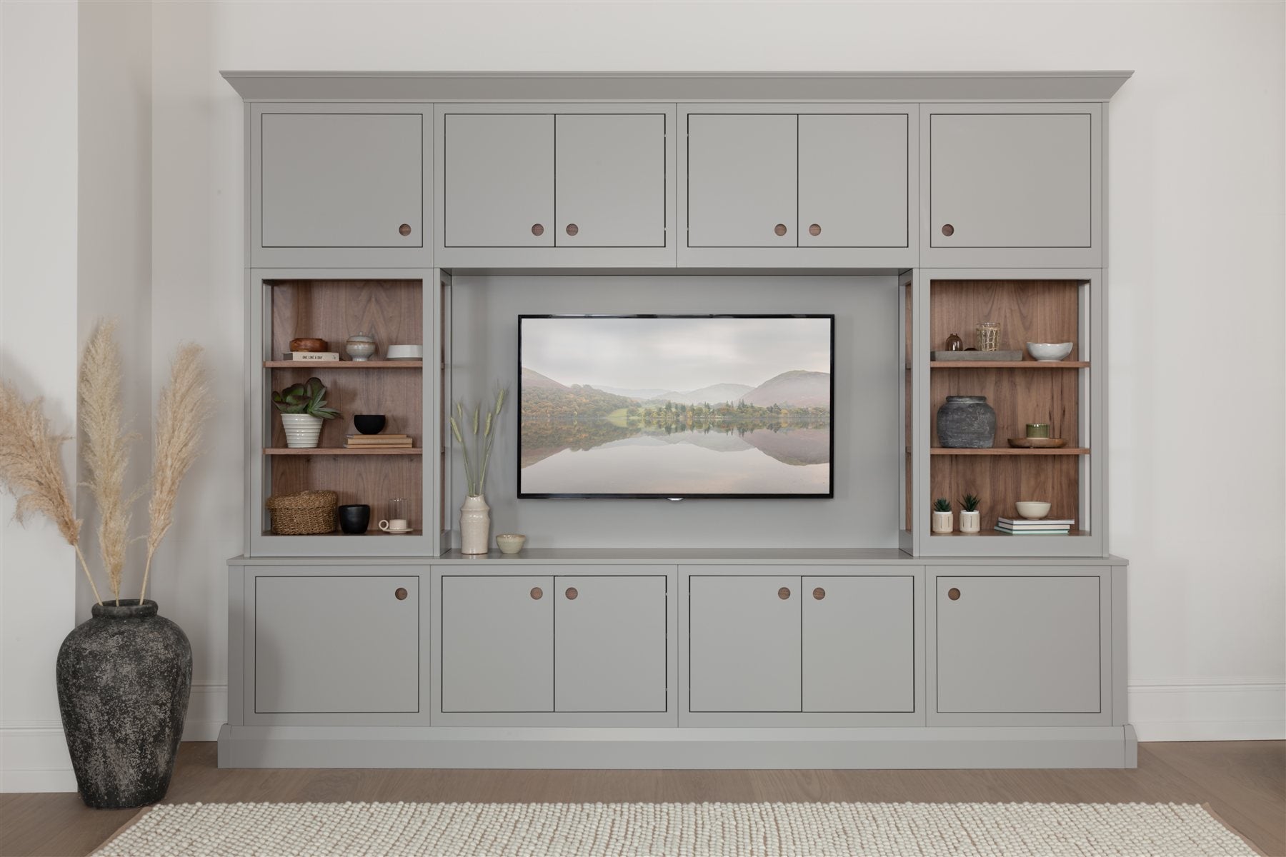 Interior inspiration: fitted media cabinetry with timber-lined display shelves